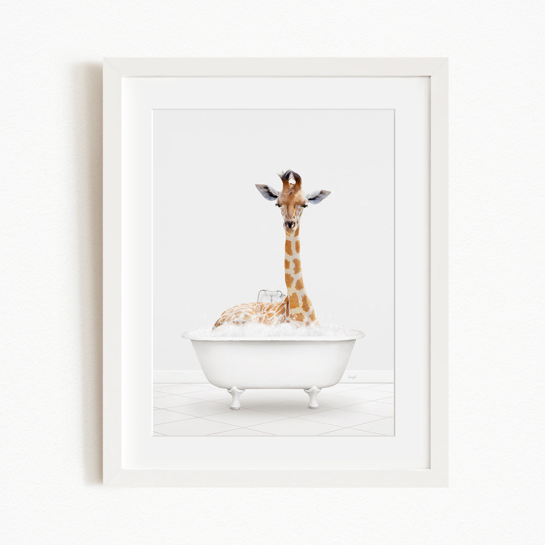 A giraffe sitting in a white bathtub filled with water, creating a whimsical and playful scene.