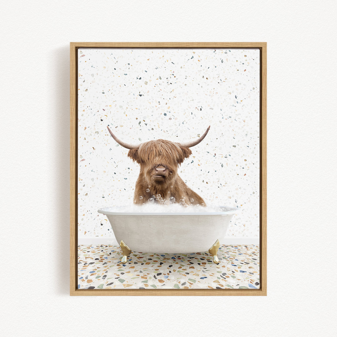 A brown cow with long horns is sitting in a white bathtub filled with water, surrounded by a speckled pattern on the floor.