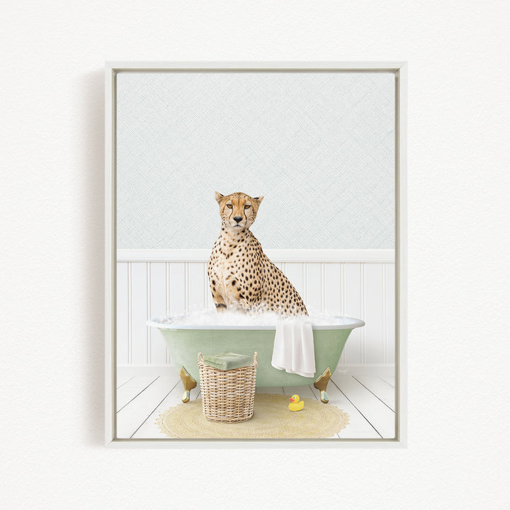 A cheetah sitting in a green bathtub filled with water, surrounded by a yellow rubber duck and a wicker basket.