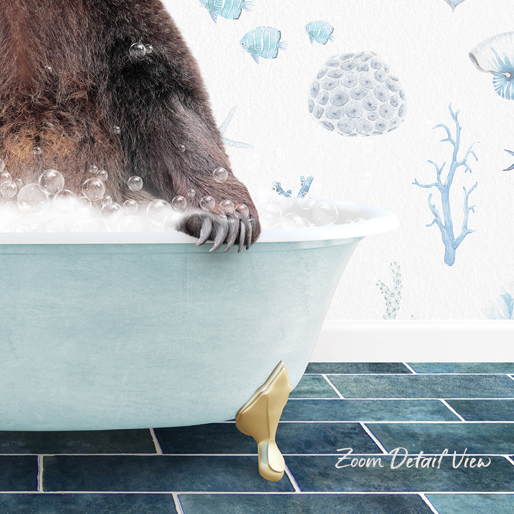 A bear is sitting in a bathtub filled with bubbles, with a blue and white underwater scene visible in the background.