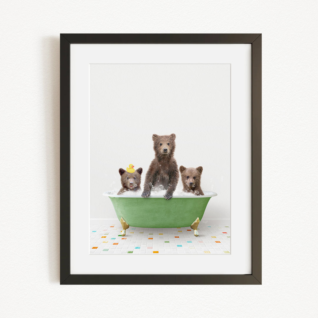 A framed image depicting three adorable brown bears sitting in a green bathtub filled with water and bubbles.