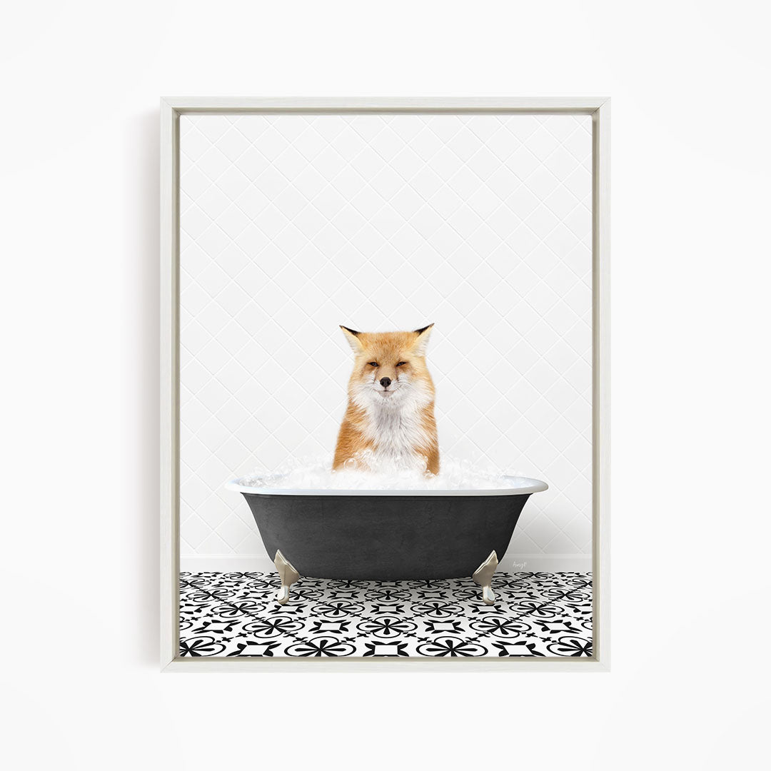 A red fox is sitting in a bathtub filled with water, looking relaxed and enjoying the experience.