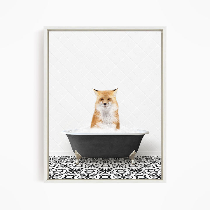 A red fox is sitting in a bathtub filled with water, looking relaxed and enjoying the experience.