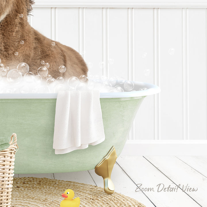 A dog is sitting in a green bathtub filled with bubbles, surrounded by a yellow rubber duck and a white towel.