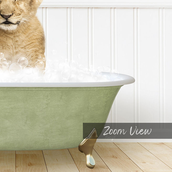 A cat is sitting in a green bathtub filled with bubbles, with a white wall in the background.