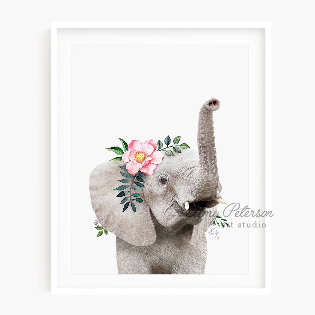 a picture of an elephant with a flower on its head