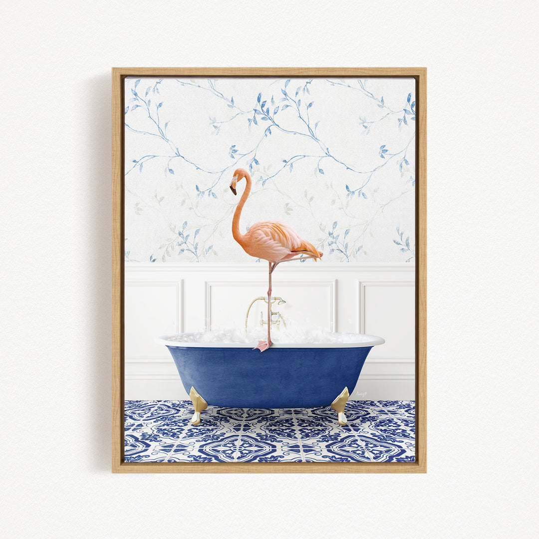 A pink flamingo standing on the edge of a blue bathtub filled with water, set against a floral wallpaper background.