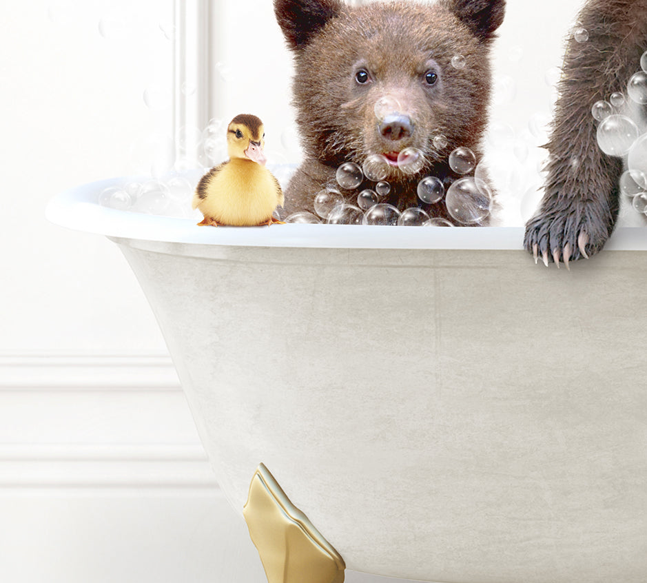 two bears in a bathtub with bubbles and rubber ducks