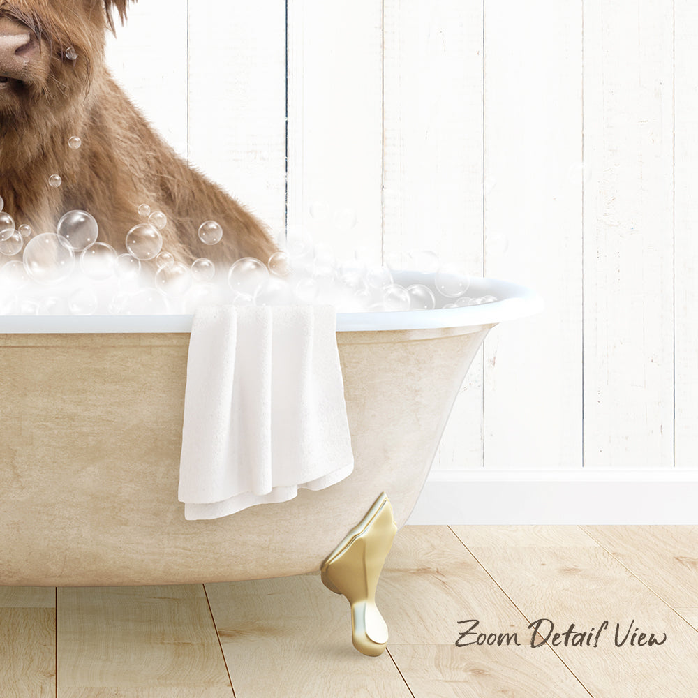 A brown dog is sitting in a bathtub filled with bubbles, with a towel and gold bathtub leg visible.