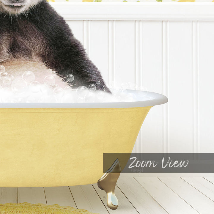 A cat is sitting in a yellow bathtub filled with bubbles, enjoying a relaxing bath.