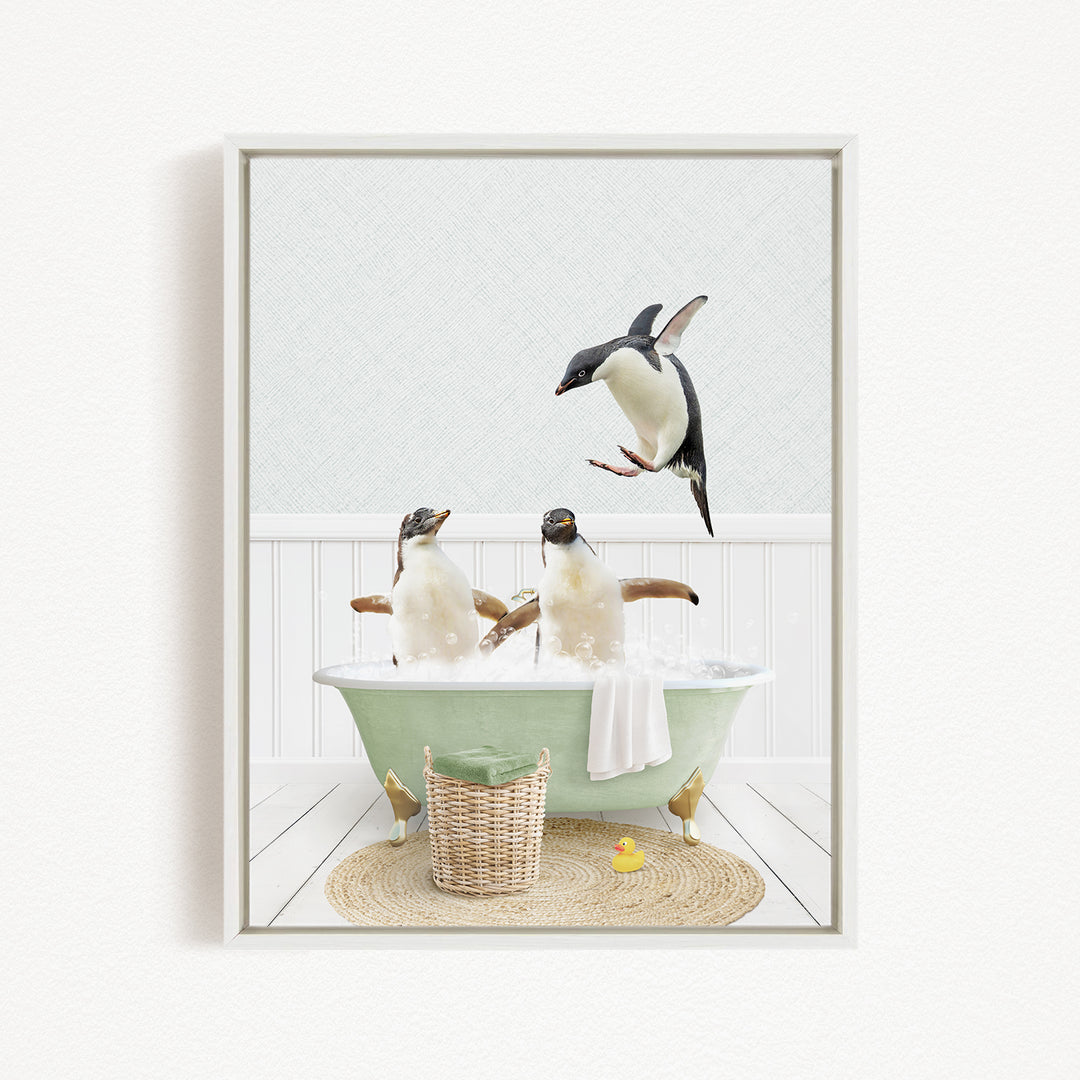 A framed image depicting two penguins sitting in a green bathtub, with one penguin flying towards the other.