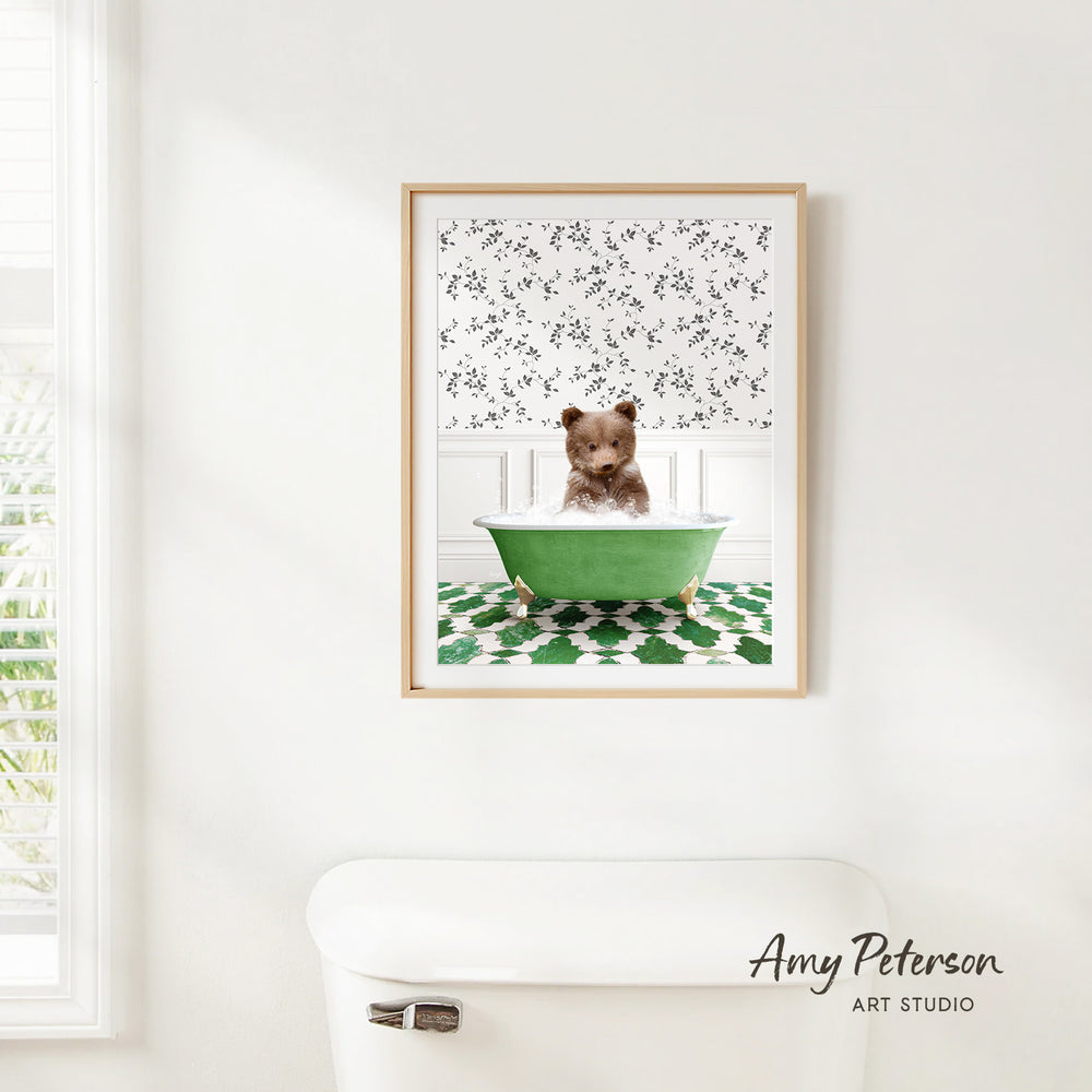 A framed image of a small dog sitting in a green bathtub filled with water, surrounded by a patterned wall.