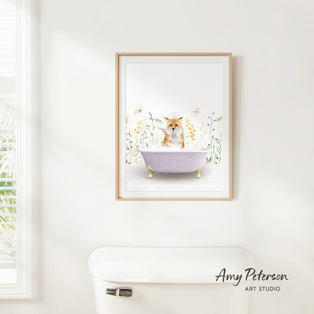 A framed illustration of a cat sitting in a bathtub surrounded by flowers and butterflies.