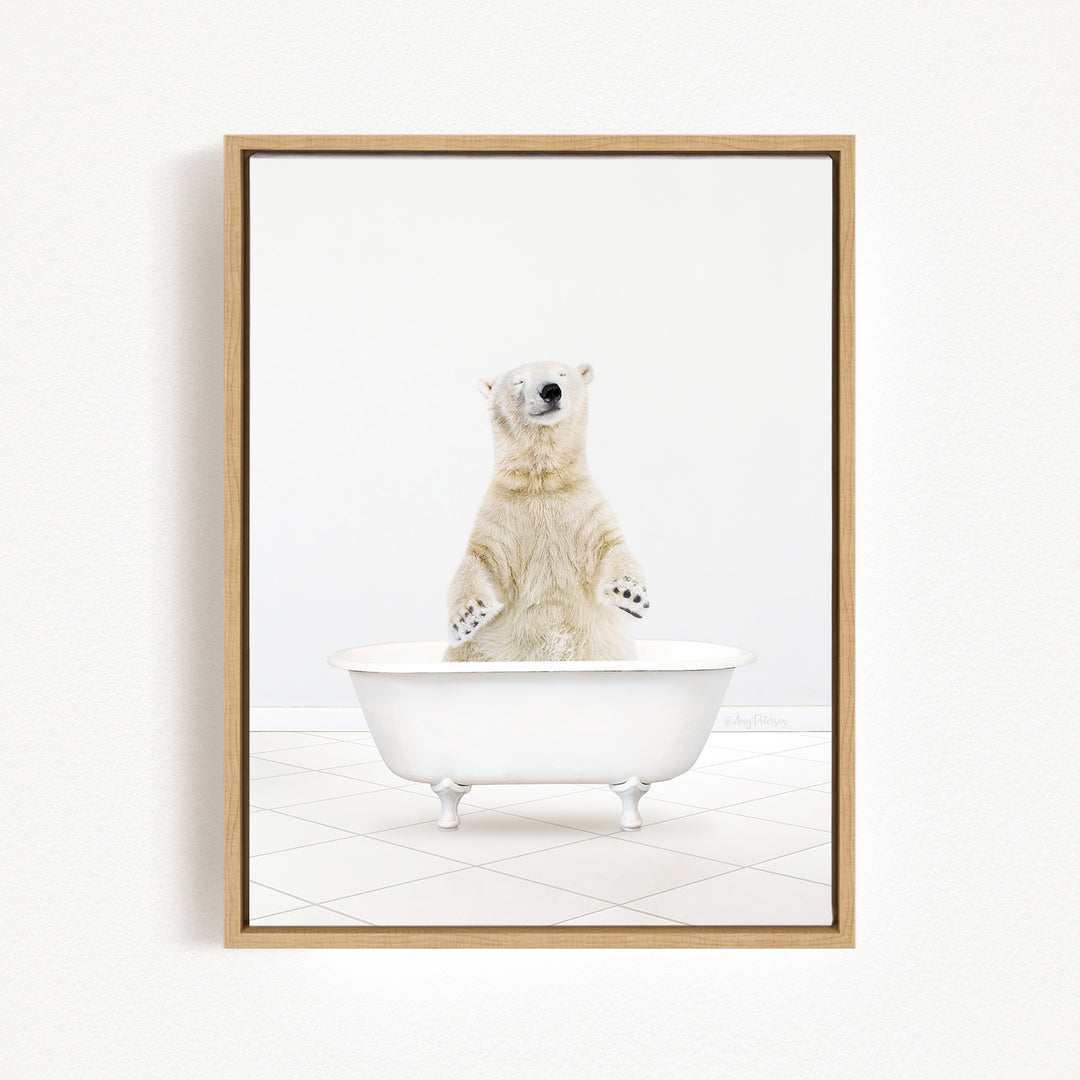 A polar bear standing in a white bathtub, with its paws hanging out of the tub.