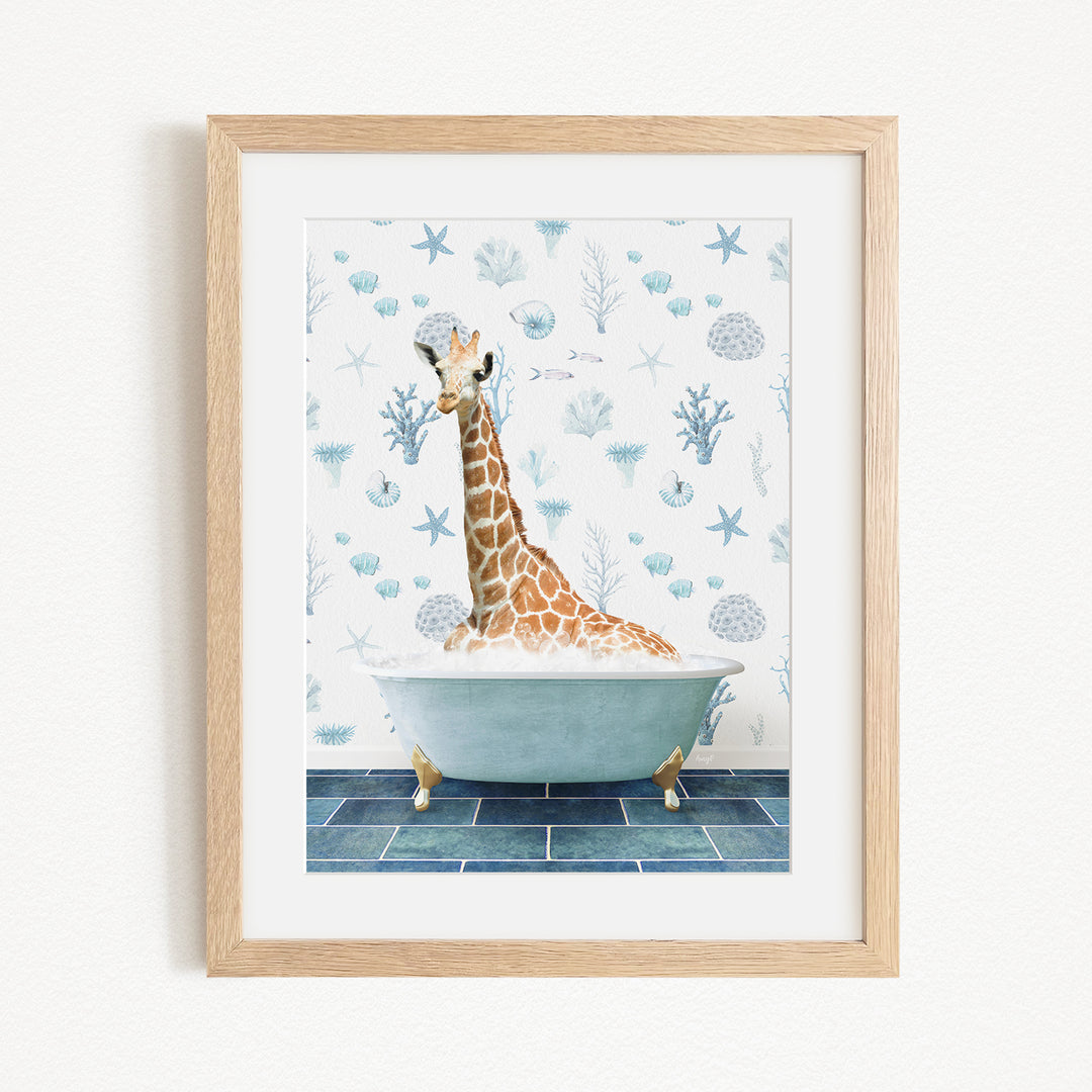 A giraffe sitting in a bathtub filled with bubbles, surrounded by a blue and white ocean-themed background.