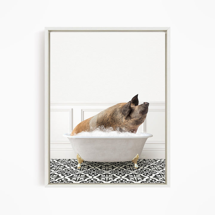 A pig is sitting in a white bathtub filled with water, surrounded by a black and white patterned floor.
