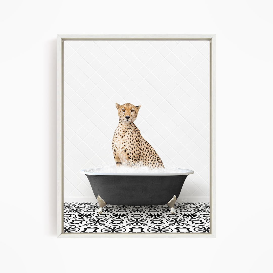 A cheetah sitting in a bathtub filled with water, surrounded by a black and white patterned floor.