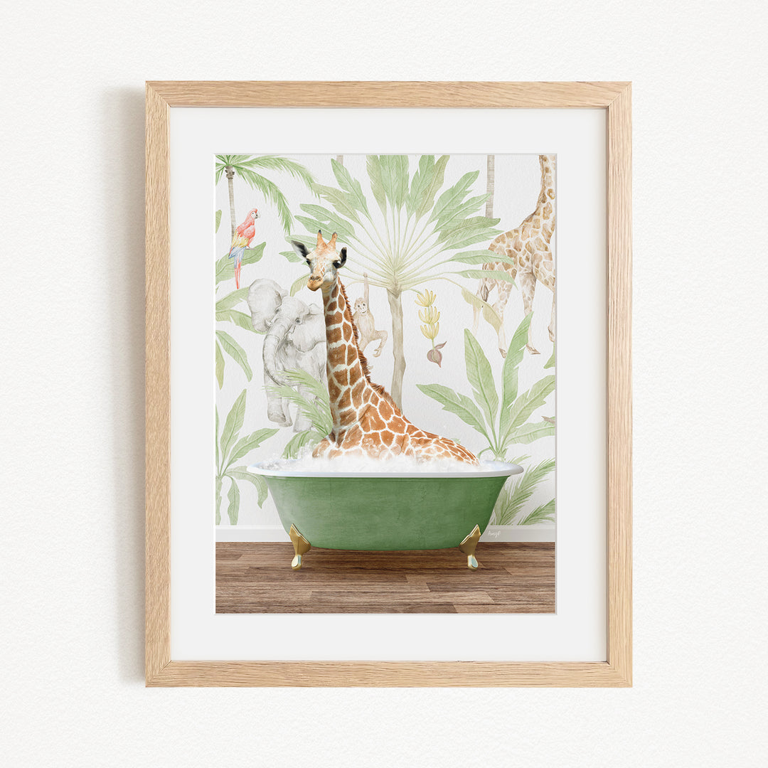 A giraffe is sitting in a green bathtub, surrounded by tropical foliage, in the image.