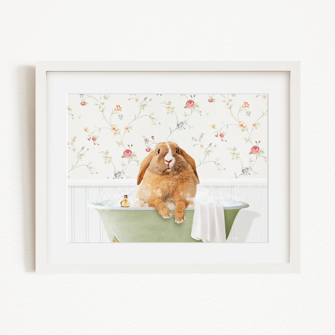 A brown rabbit sitting in a green bathtub filled with water, surrounded by a floral wallpaper.