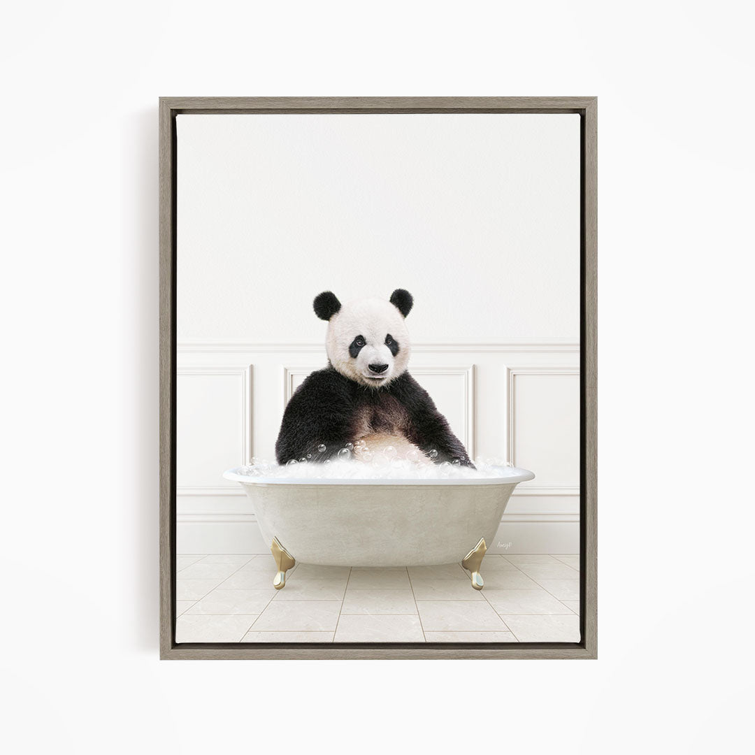 A panda bear sitting in a white bathtub filled with bubbles, appearing to enjoy the bath.