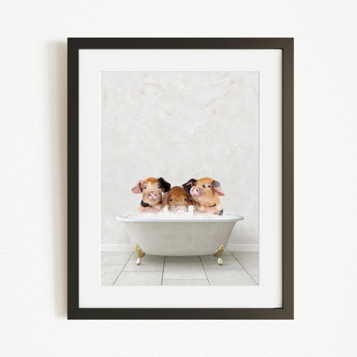 Three adorable pigs sitting in a white bathtub, enjoying a relaxing bath.