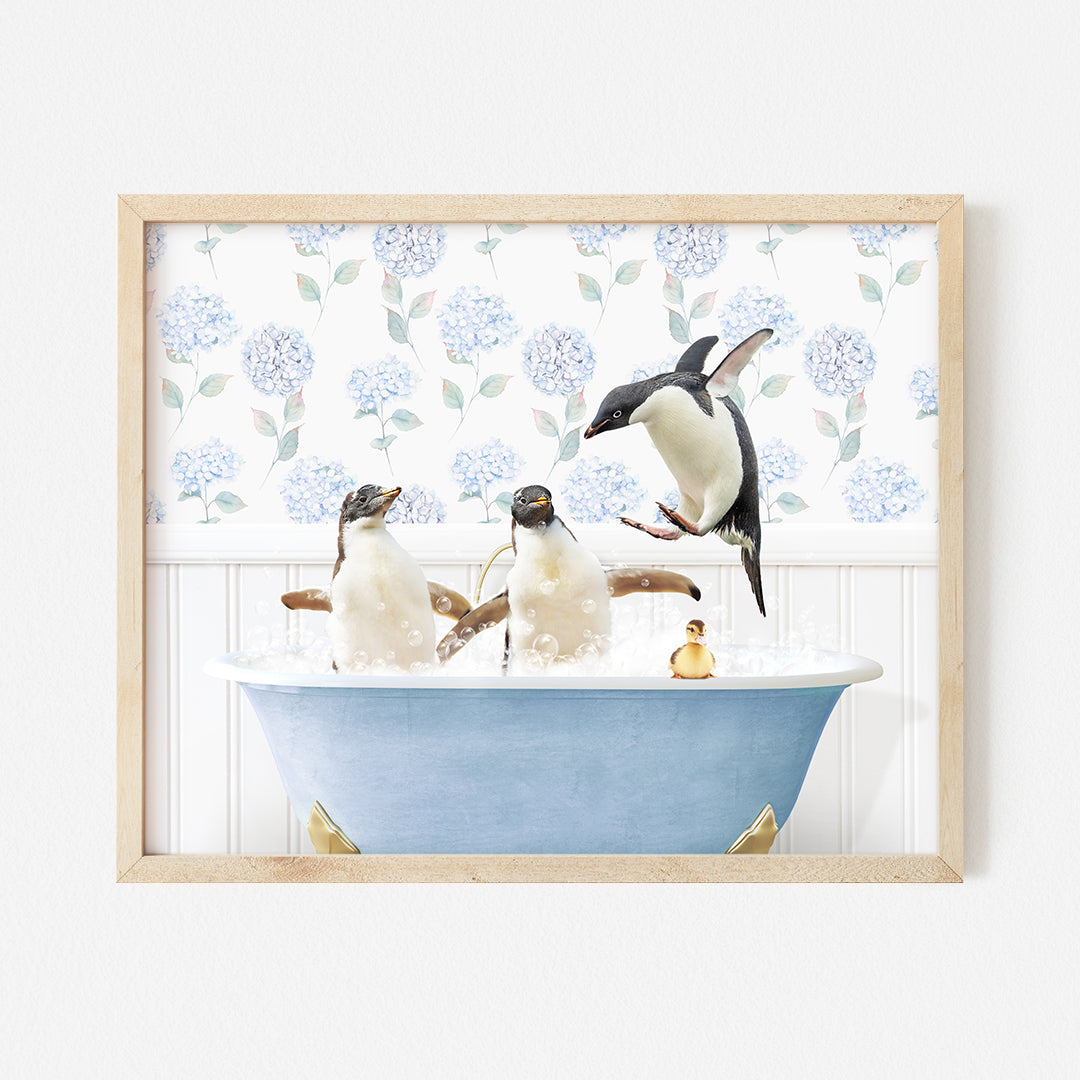 a picture of three penguins in a bathtub