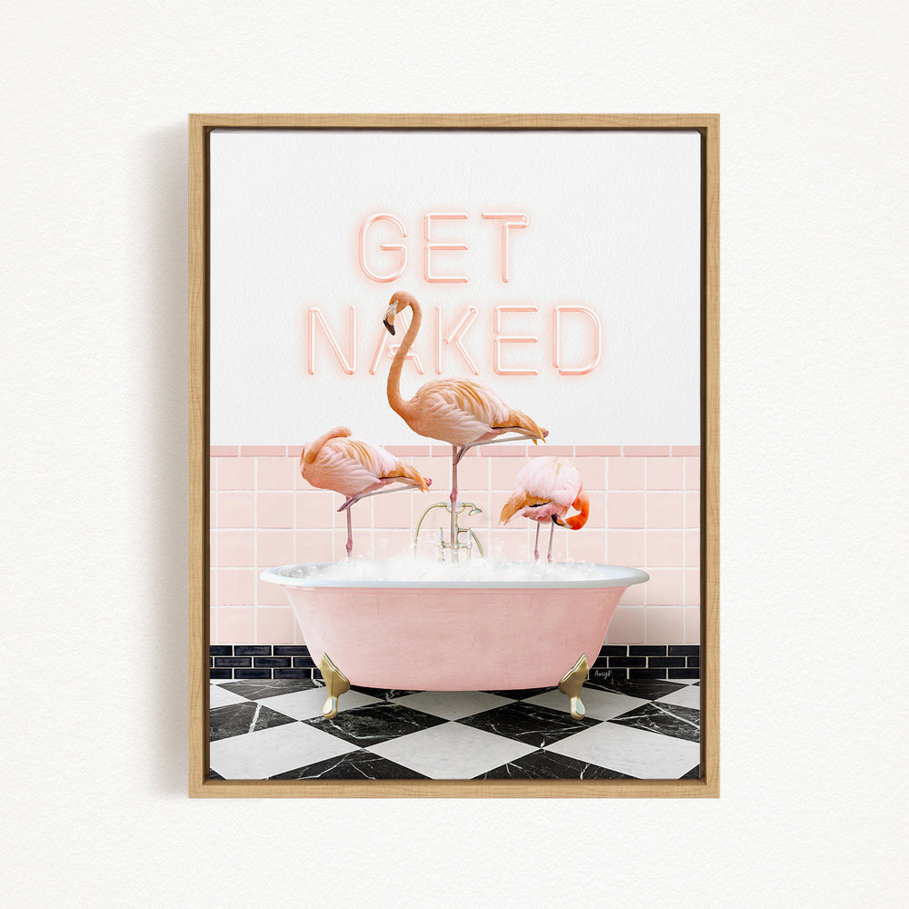 A framed image depicting three flamingos standing in a pink bathtub, with the text "GET NAKED" displayed above them.