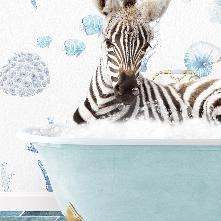 a baby zebra laying in a bath tub