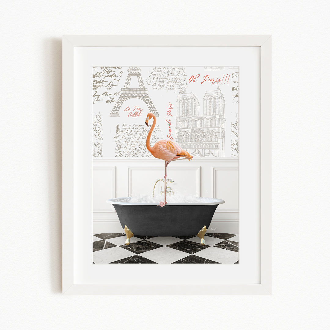 A framed image depicting a pink flamingo standing in a bathtub, with a black and white checkered floor and a Paris-themed background.
