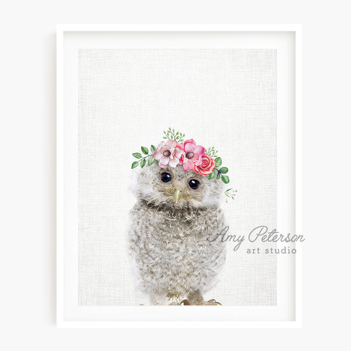 a picture of an owl wearing a flower crown