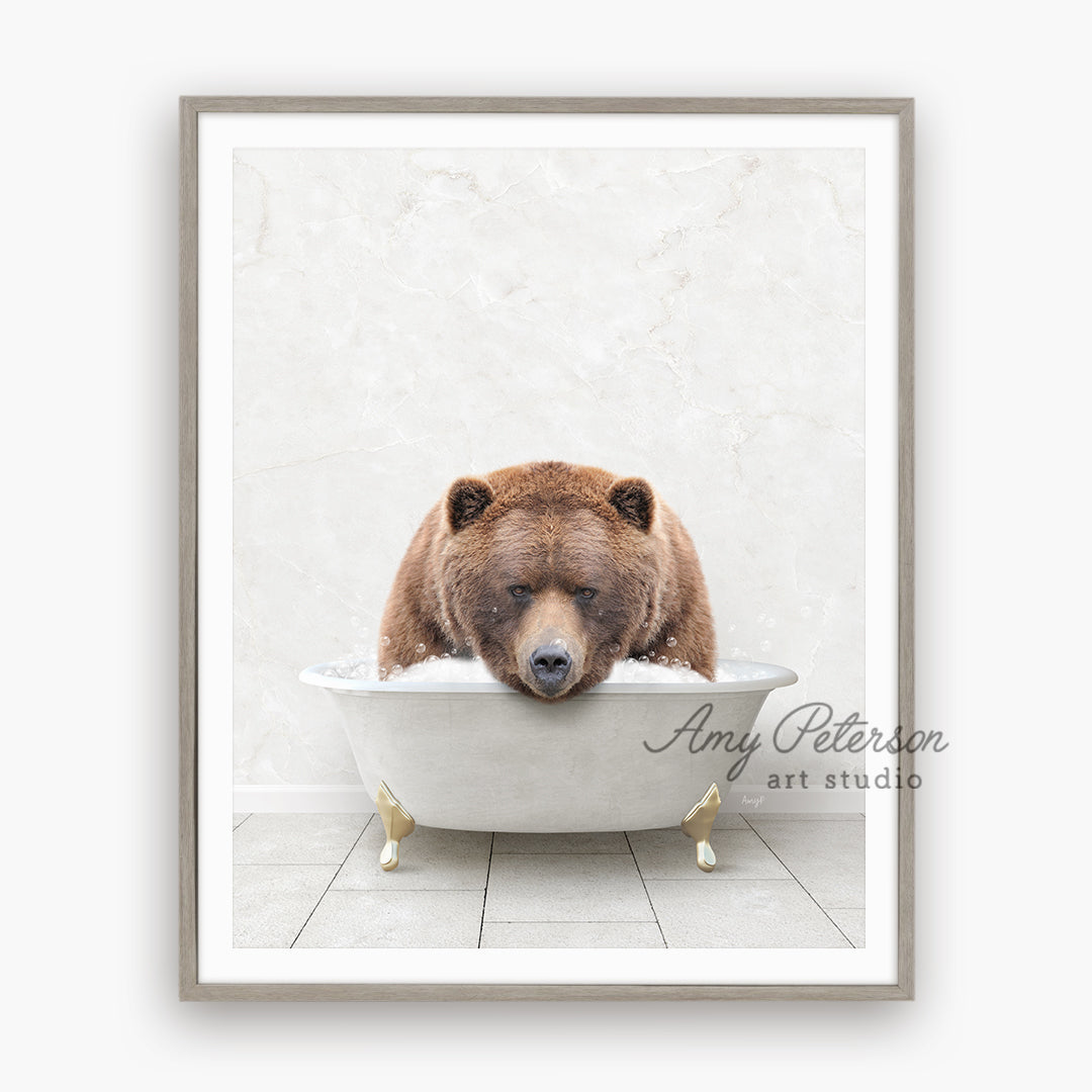 a brown bear sitting in a bath tub