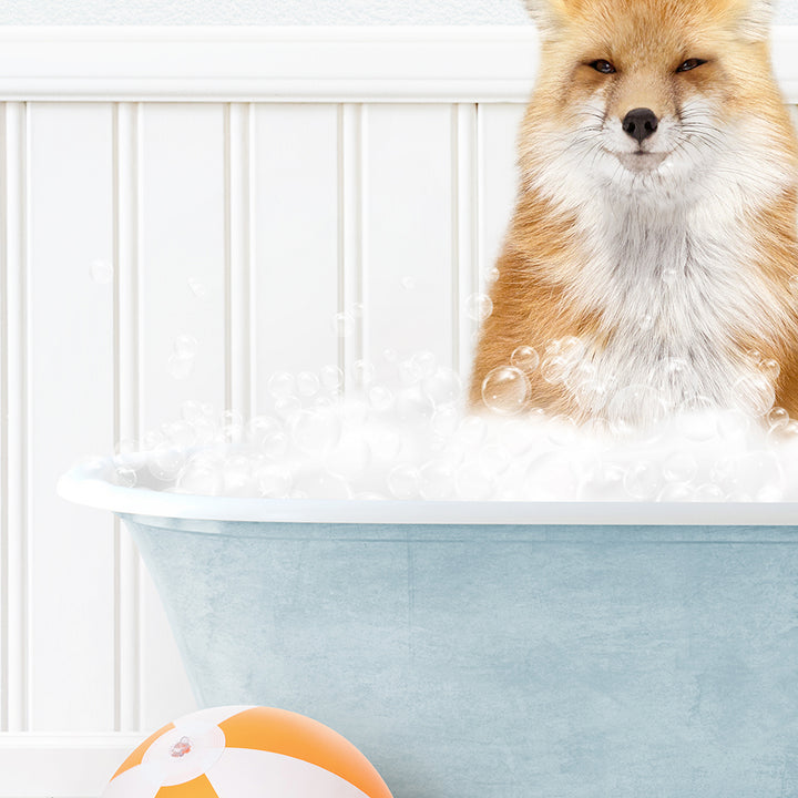 a dog sitting in a bathtub full of bubbles