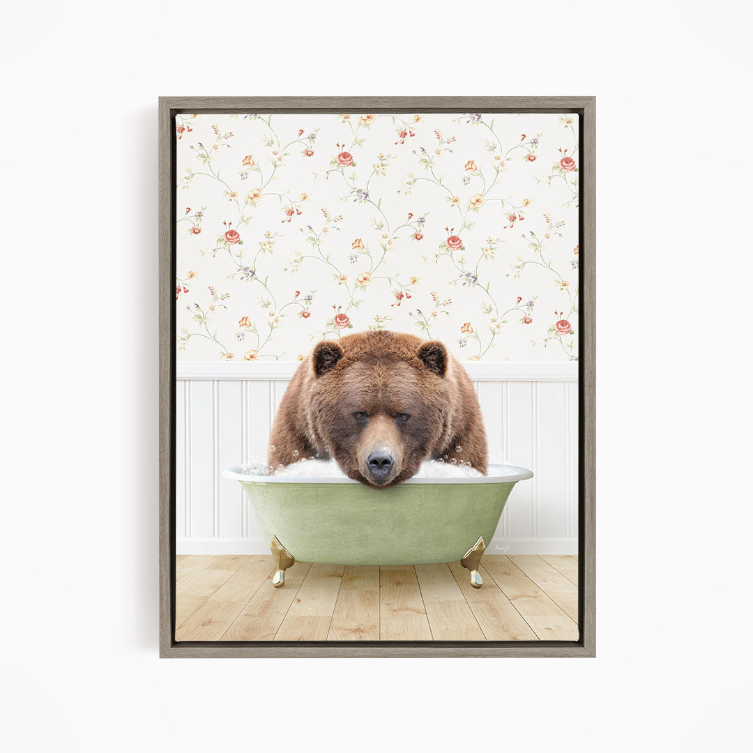 A brown bear is sitting in a green bathtub, appearing to be enjoying a relaxing bath.