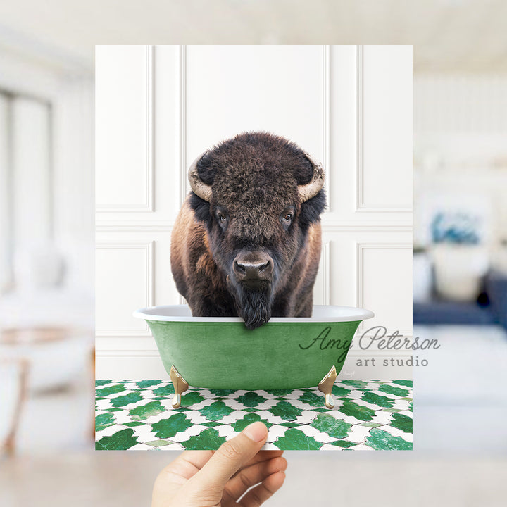 a bison is standing in a green bowl