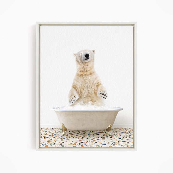 A polar bear standing in a bathtub filled with water, with its paws raised in the air.