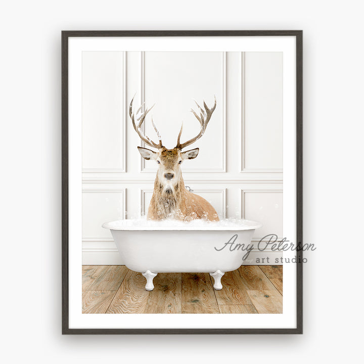 a picture of a deer sitting in a bathtub