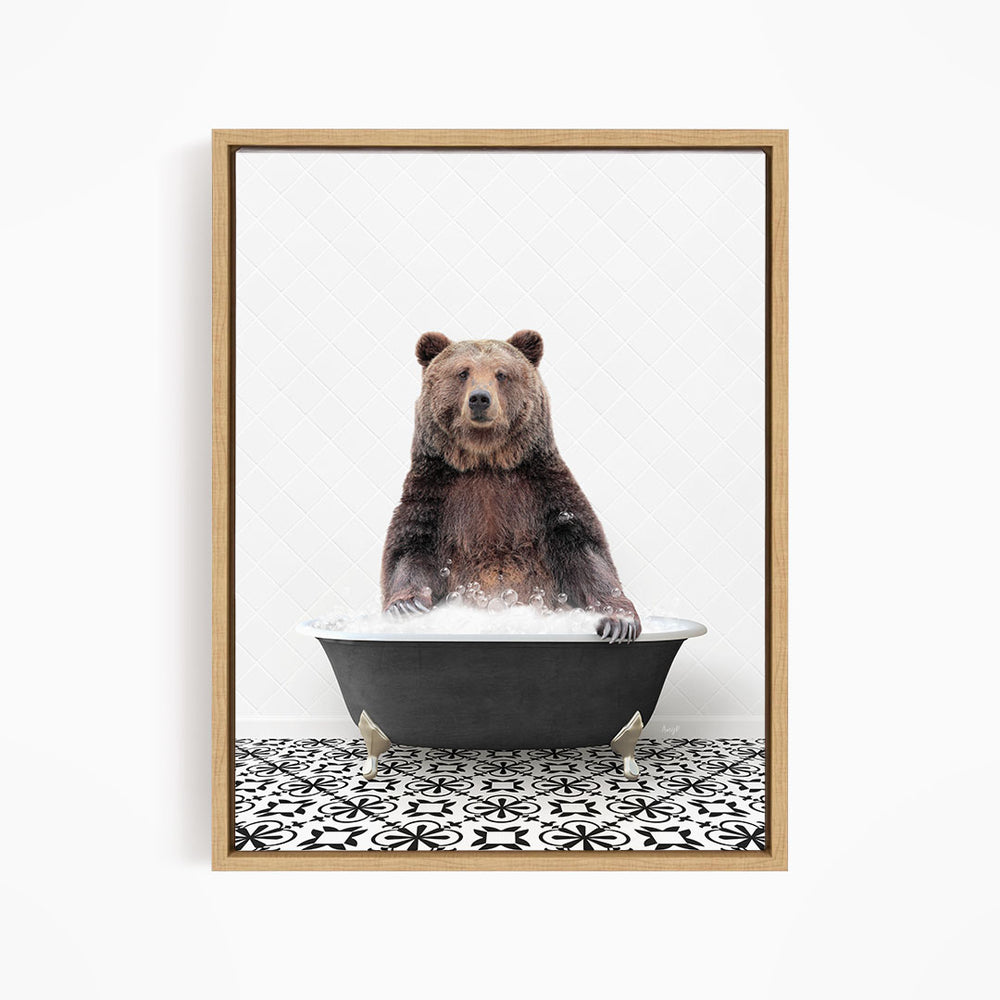 A brown bear sitting in a bathtub filled with water, surrounded by a black and white patterned floor.