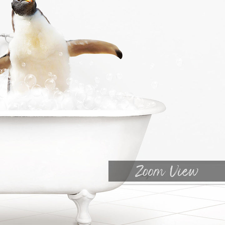 A penguin standing in a white bathtub filled with bubbles, with the text "Zoom View" below the image.