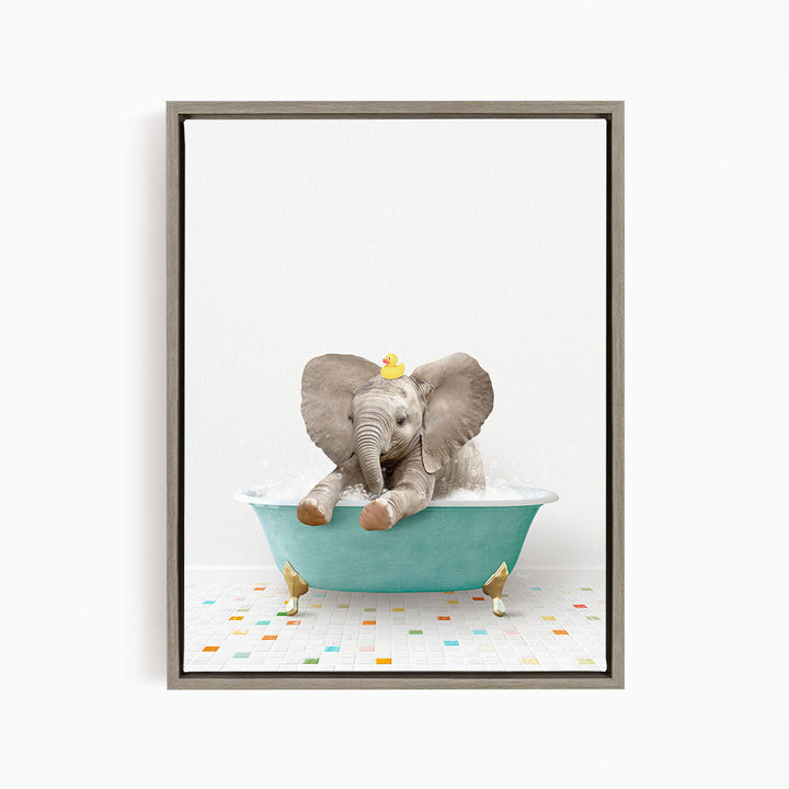 A baby elephant sitting in a blue bathtub, with a yellow rubber duck on its head, and a colorful tiled floor in the background.