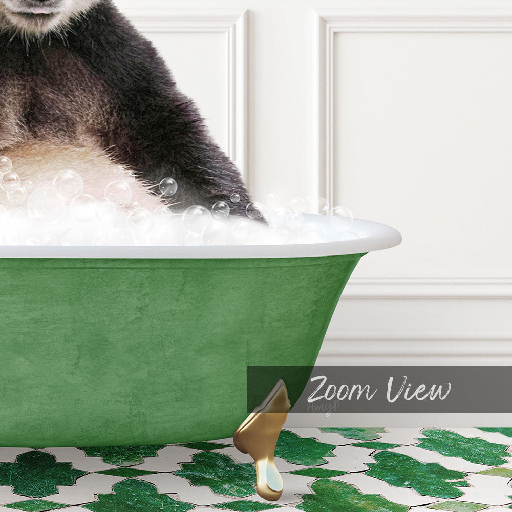 A cat is sitting in a green bathtub filled with bubbles, with its paw in the water.