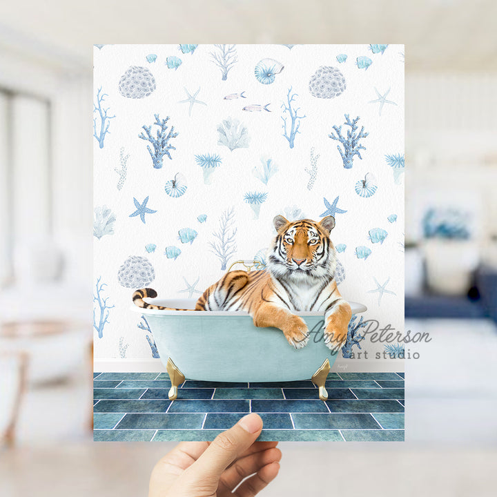 a hand holding up a card with a picture of a tiger in a bathtub