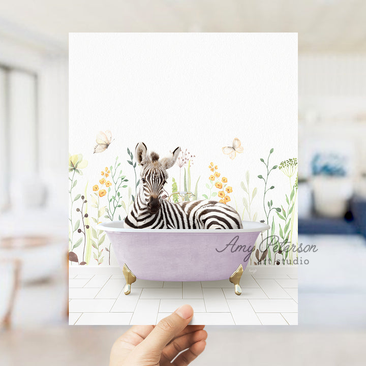 a person holding up a card with a zebra in a bathtub