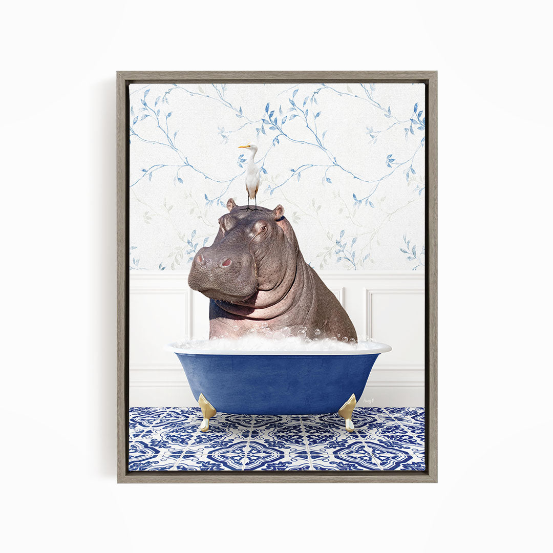 A large hippopotamus sitting in a blue bathtub, with a white bird perched on its head.