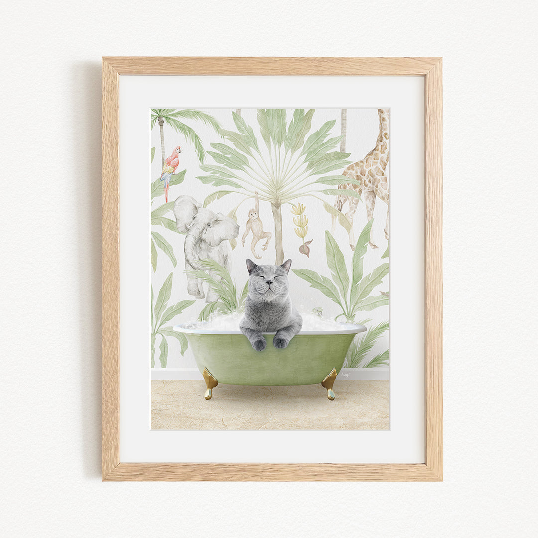A framed illustration depicting a gray cat sitting in a green bathtub, surrounded by various animals and plants, including a giraffe and a monkey.