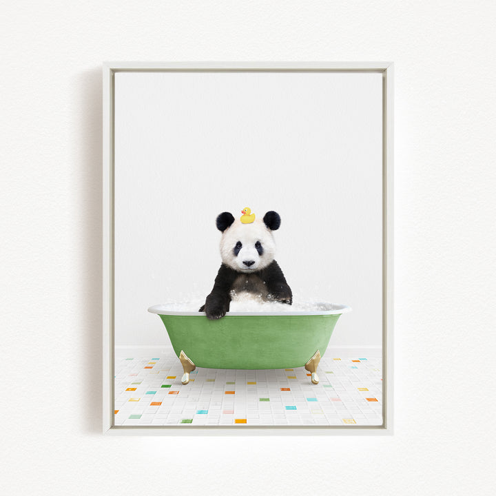 A panda bear sitting in a green bathtub filled with bubbles, with a rubber duck floating on the water.