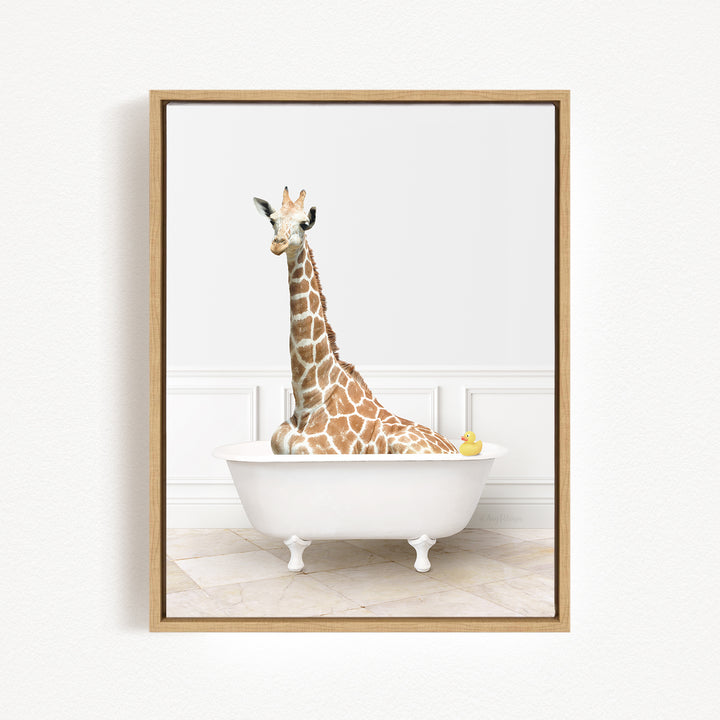 A giraffe sitting in a white bathtub, with a yellow rubber duck floating in the water.