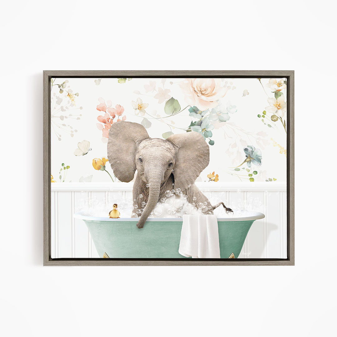 A gray elephant is sitting in a green bathtub filled with bubbles, surrounded by a floral pattern.