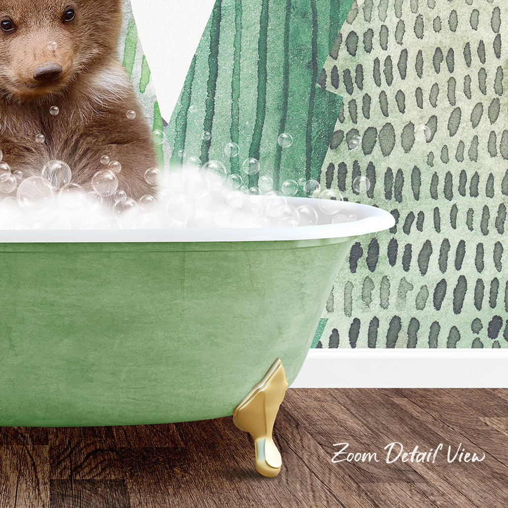 A brown bear is sitting in a green bathtub filled with bubbles, with a patterned wall in the background.