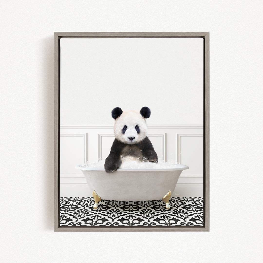 A panda bear sitting in a white bathtub filled with bubbles, surrounded by a black and white patterned floor.