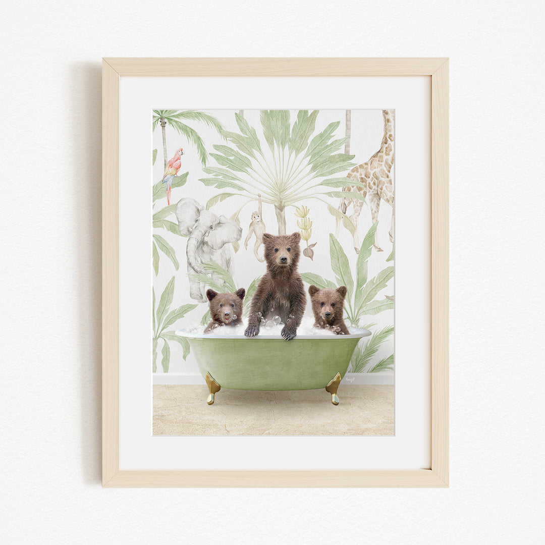 A framed print depicting three bears sitting in a green bathtub, surrounded by a tropical jungle scene with various animals and plants.